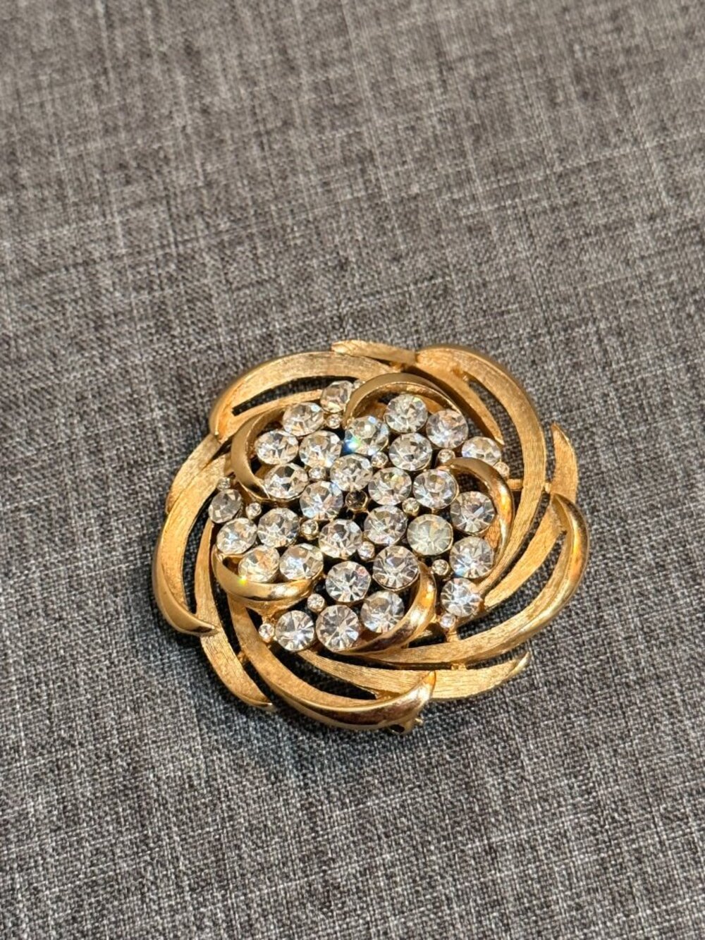 Signed Trifari Gold-Tone Rhinestone Swirl Brooch — Missing Center Stone